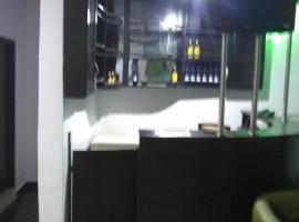 Tom Hotels and Suites，位于洛根维尔的酒店