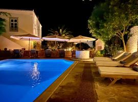 伊科诺姆公寓酒店，位于斯派赛斯的带泳池的酒店