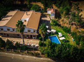 Hotel Restaurante Las Buitreras，位于El Colmenar的酒店