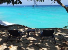 Anda Poseidon’s Beach Resort，位于安达的度假村