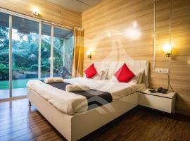 Zulu Land cottages - near Curlies beach shack and shiva valley - Anjuna beach，位于安君纳的酒店