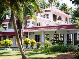 Ashirvad Homestay, Ashtamudi Lake, Kollam，位于奎隆的酒店