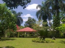 Los Palmares Guest House & Eventos，位于San Cristóbal的酒店