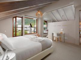 Hotel Boutique Mediod&iacute;a & Apartments，位于普兰的低价酒店