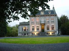 Au Château des Thermes，位于圣阿芒莱索的酒店