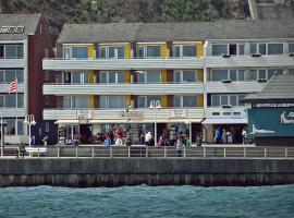 奎西公寓奎西萨那酒店，位于黑尔戈兰岛赫尔戈兰海港码头附近的酒店