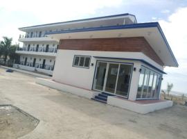 Tomzen Beachfront Suites，位于巴旺的酒店