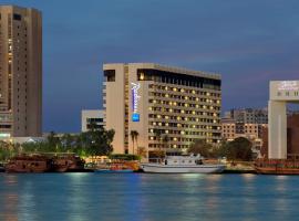 迪拜德伊勒河丽笙酒店，位于迪拜Twin Towers Shopping Centre附近的酒店
