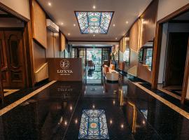 Luxva Hotel Boutique，位于瓜亚基尔Catholic University of Santiago de Guayaquil附近的酒店