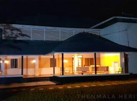 Thenmala Heritage，位于奎隆Palaruvi Waterfall附近的酒店