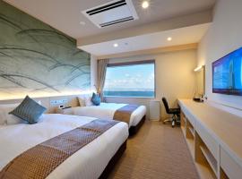 Oriental Suites Airport Osaka Rinku，位于泉佐野的酒店