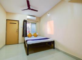 SPOT ON 66458 Hotel Vighnaghar Lodge，位于Arwi的酒店