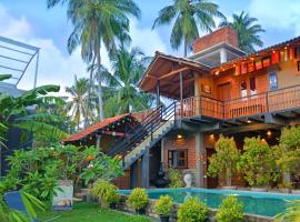 Negombo The Nature Villa and Cabanas，位于尼甘布的海滩短租房