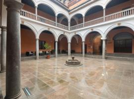 Apartamentos Palacio de los Jer&oacute;nimos，位于格拉纳达的公寓式酒店