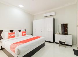 Super OYO 106 Muscat Grand Hotel Apartment，位于锡卜的酒店