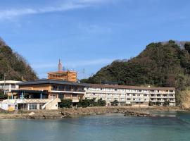 奥城崎会展酒店，位于丰冈市竹野浜海滩附近的酒店