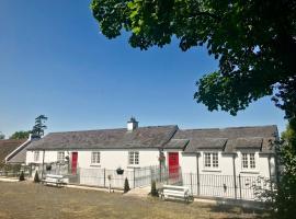 金斯米尔斯因弗小屋酒店，位于Artrea的酒店