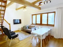 Mezonetový apartmán ve skandinávském stylu