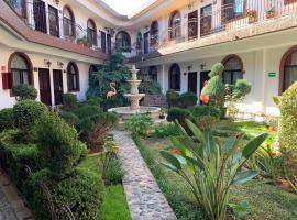 Hotel Los Arcos，位于伊达尔戈德尔帕拉尔的酒店