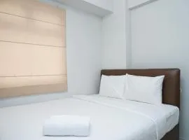 Tranquil Green Pramuka 2BR Apartment near Shopping Center By Travelio