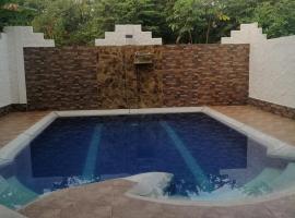 Hotel Brisas Del Magdalena，位于拉多拉达的带泳池的酒店