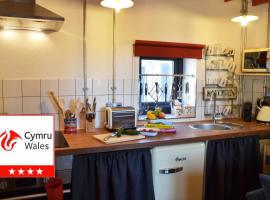 Grain Store Cottage，位于纳伯斯的酒店