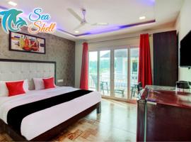Sea Shell Beach Cottages & Suites，位于阿姆波尔的酒店