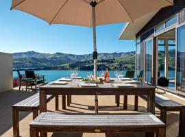 Kotare Point Paradise - Akaroa Holiday Home，位于阿卡罗阿的度假屋