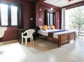 SPOT ON 68802 Kps Tourist Home，位于Edavanna的酒店