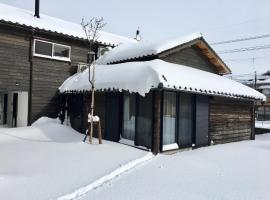 上涨住宿加早餐旅馆，位于能美市的酒店