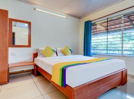 Treebo Trip Avaas Holiday Homes Coorg，位于马迪凯里的酒店