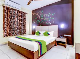 Treebo Trend Petals Suites Ernakulam Town，位于科钦喀拉拉邦高等法院附近的酒店