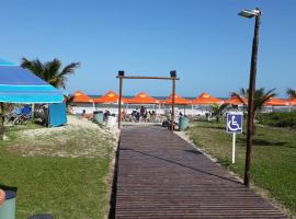 Rota do Sol Praia Hotel，位于瓜拉图巴的酒店