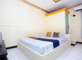SPOT ON 2473 Buana Jaya Guest House，位于芝拉扎的酒店