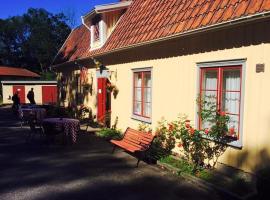 Hunnebostrands vandrarhem Gammelgården，位于亨尼博斯特兰德的酒店