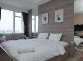 Cozy and Tranquil Studio Menteng Park Apartment By Travelio