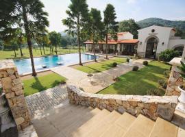 梅拉花园度假小屋，位于穆克莱克的酒店