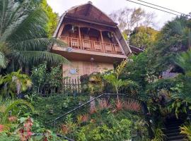 Camiguin Blue Lagoon Cottages，位于Mahinog的山林小屋