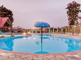 Treebo Tryst Blue Mountain Country Club And Resort，位于西里古里巴格多格拉机场 - IXB附近的酒店