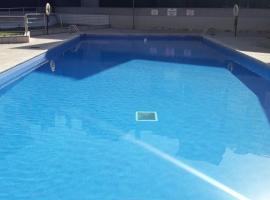 Duplex con piscina VUT1230AS，位于La Arena的酒店