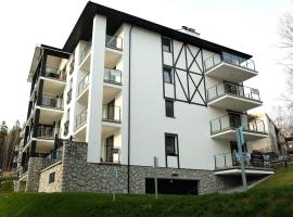 Apartamenty Rebergen w kompleksie Apartamenty Piano，位于希维拉杜夫-兹德鲁伊Świeradów-Zdrój Ski LIft附近的酒店