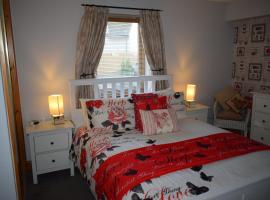 Dunroamin Self-Catering Apartment，位于阿维莫尔的酒店