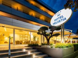 Hotel Helvetia，位于利尼亚诺萨比亚多罗Pineta的酒店