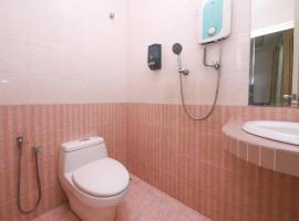 OYO 89705 Nexus Hotel，位于Kampong Tampoi的酒店