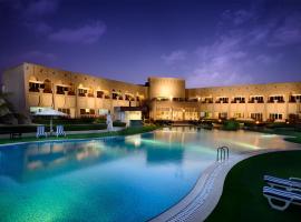 马斯拉岛度假酒店，位于Ḩilf的住所