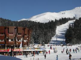 LE SAPORTA- Studios et Appartements meublés de tourisme，位于勒利然比龙杜巴盖特滑雪缆车附近的酒店