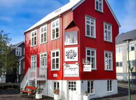 雪鸟之家公寓，位于雷克雅未克冰岛内阁办公室附近的酒店