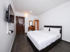 SPOT ON 89801 Sweet Home Hotel Sabak Bernam，位于沙白安南的酒店