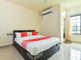 OYO 61727 Vr Lodge，位于阿勒皮的酒店