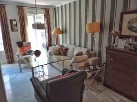 Duplex, terraza, 10 min coche centro Sevilla，位于卡马斯的公寓